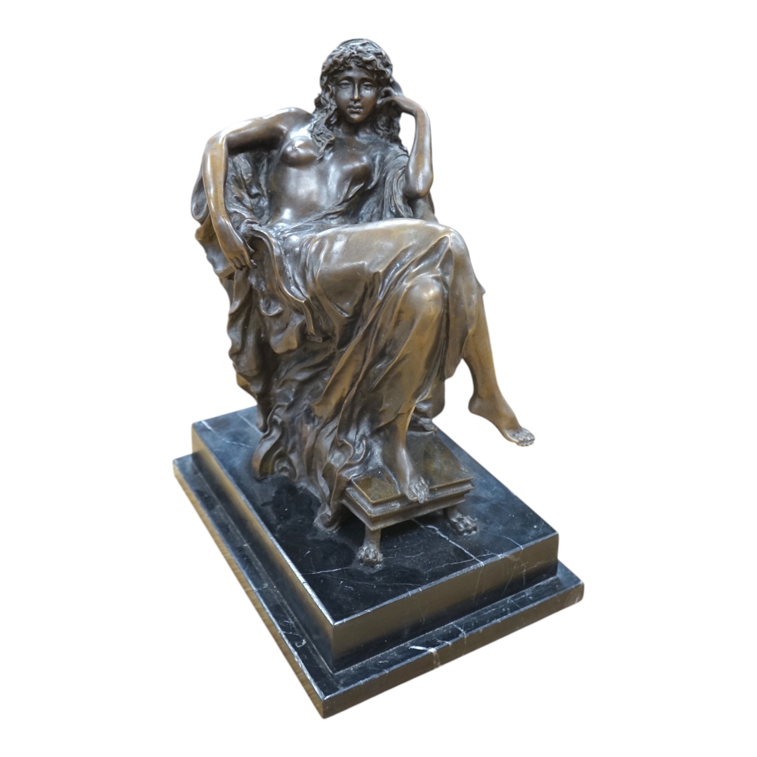 A decorative bronze study of a seated woman, raised on a stepped marble plinth, signed Chiparus, 41cm high. Condition - good